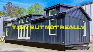 Explore Dogwood 'Tiny' Home Lives Extra-Large With 3 Bedrooms, 2 Baths, and One Massive Kitchen