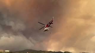 Firefighters work to control the Airport Fire in Orange County, California