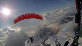 Extreme Paragliding over clouds - 12 degrees below zero