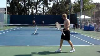 Marat Safin hitting the ball to the Grandstand court