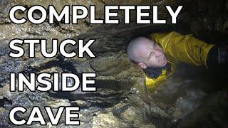 DIVERS REACT TO MAN STUCK DEEP INSIDE A CAVE