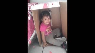Emily playing in the box