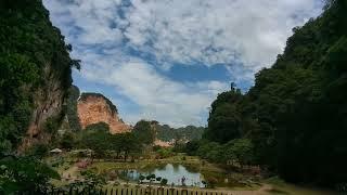 Kek Lok Tong Ipoh. Watch the sky filled with massive columns of smoke from rock blasting activities.