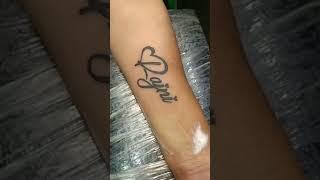 Rajni name font tattoo design