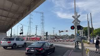 BNSF 180 rolls through 32nd Street Railroad Crossing, San Diego CA 8-6-24