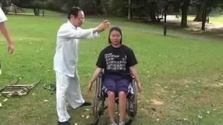 Medical Qigong (Han Yang Ru Yi Gong) GM Dr. Shao Xing Xuan treats paralyzed wheelchair user