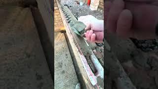 Skilled Worker’s Technique for Spreading Mortar
