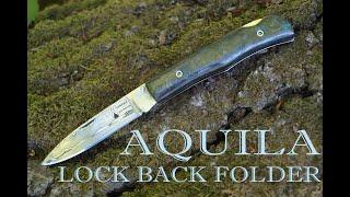 Aquila lock back folder launch