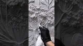 Bas-relief artist Elena Kova