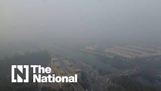 Drone footage shows New Delhi shrouded in a blanket of toxic smog