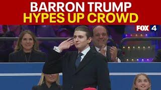 Barron Trump urges on cheering crowd at presidential parade