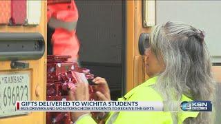 Wichita school bus drivers deliver Christmas gifts