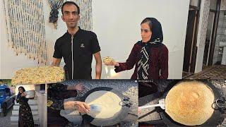 Baking bread by the mother of the family : Vahid's help to child labor