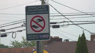 Greensboro leaders put up new signs to discourage panhandling