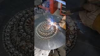 Artist Welds Magnificent Bowl from Bicycle Chains and Hardware