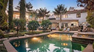 A Gated Los Angeles residence offers absolute privacy and tranquility for $9,799,000