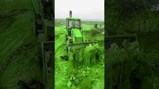 JCB is lifting the soil stone together and loading on the Tractor. #shorts#jcb#ytshorts#tractor