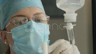 Doctor Preparing Anesthetic (Hd). Stock Footage