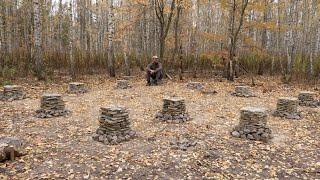 1 month  building a stone foundation for a log cabin by hand