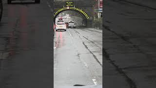 flooding under the bridge at West vale