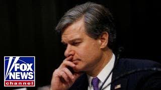 FBI Director Wray on defense during annual threat hearing