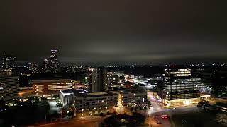 360+ aerial view of downtown Austin Texas on a Saturday night.