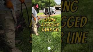 Clearing a clog with a sewer jetter #shorts