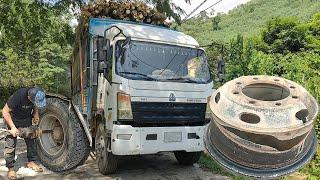 5 hours help repair a truck driver's broken rim in the woods