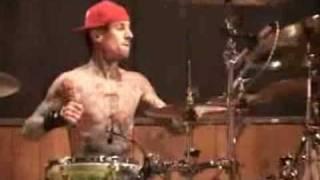 Travis Barker Playing Drums with One Arm