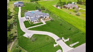 This incredible home has a CUSTOM 3600 Square Foot Basketball Court!!@thegrisakgroup