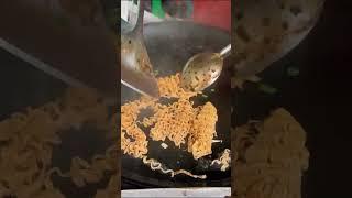 local Vietnamese street food - instant noodles stir-fried with water