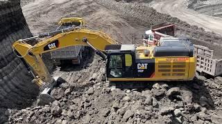 Caterpillar 352F Excavator Loading Trucks