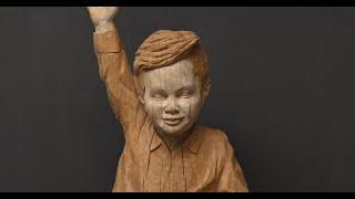 Little boy with unique posture #woodsculpture (Simeon Decker)