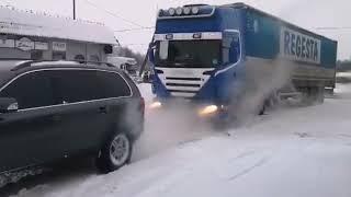 Volvo XC90 pulling truck out of snow. Volvo AWD power. DDrive