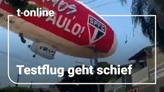 Zeppelin stürzt über Wohnviertel ab