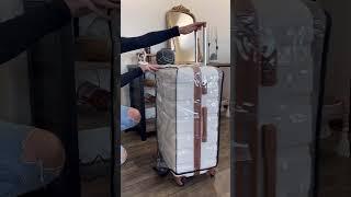 This clear luggage cover protects your checked bag