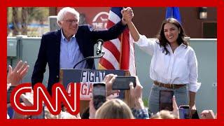 AOC and Bernie Sanders take aim at Republicans and Democrats during rally tour