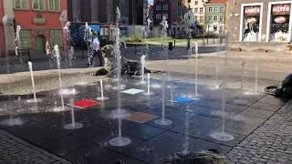 Eric Clark's Travel Videos - Gdansk Poland - Fountain during the day infront of churches