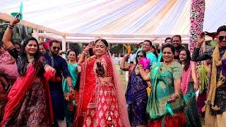 bride's family welcoming the groom - surprise welcome - bride dance- best baarat dance