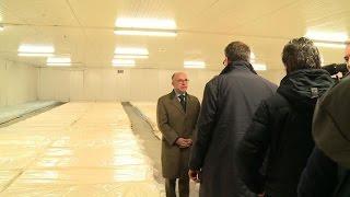 French Interior Minister visits new refugee centre in Calais