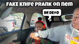 FAKE Knife prank on nem