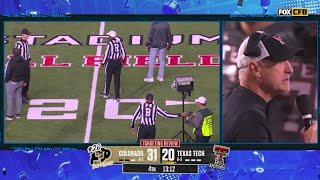 Texas Tech coach gets on the mic and yells at fans to stop throwing stuff on the field 