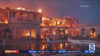 Laguna Niguel residents survey the damage from Coastal Fire
