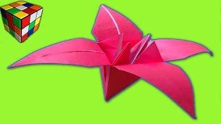Origami flowers. How to make a flower lily of the paper with your hands. Origami.
