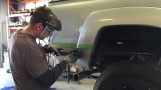 Cutting Toyota Tacoma Bed panel for Bushmaster 2.0 rear bumper by CBI Offroad Fab