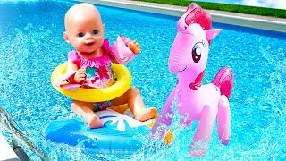 Baby Annabell doll swimming at the water pool. Baby doll goes camping. Baby dolls videos for kids.