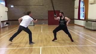 Sabre sparring with foam sabres and no protective gear.