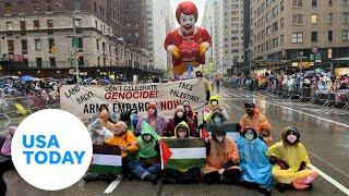 Officials arrest protesters amid Macy's Thanksgiving Day parade | USA TODAY