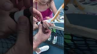 Teaching child backhand tennis grip using the Tennis Grip Guide found at tennisbuilder.com