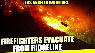 LA wildfires: Firefighters evacuate from ridgeline as Palisades fire spreads rapidly in Los Angeles